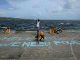 GPS | TACLOBAN | Filipino writes message on basketball court: �Help SOS!!! We Need�Food�