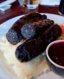 Mustamakkara (literally black sausage) is a type of Finnish blood sausage traditionally eaten with lingonberry jam.
