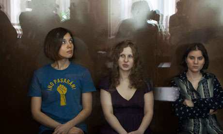 Feminist punk group Pussy Riot sit in court | Photo by Reuters