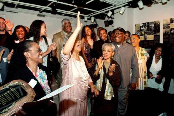Ms. Gertrude Jeannette makes her presence known. Photo by Michael Palma. — with Janice Jenkins, Pat White, Daniela Sheppard, Woodie King Jr., Ms. Gertrude Jeannette, Miss Ruby Dee, John Amos, Nabii Faison and Jackie Jeffries.| Courtesy of Coalition of Theatres of Color